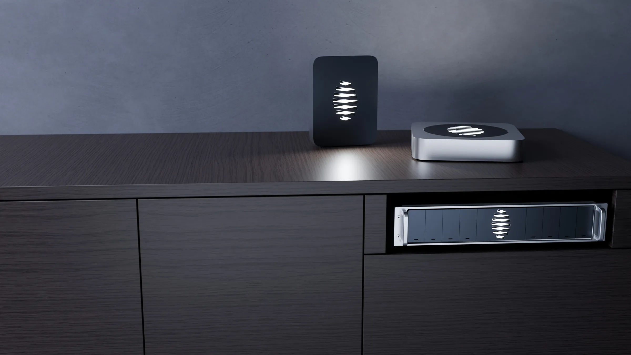 The Eigna Box family on a dark wood credenza at dusk: Home and Business on top, an Enterprise unit in an open bay below