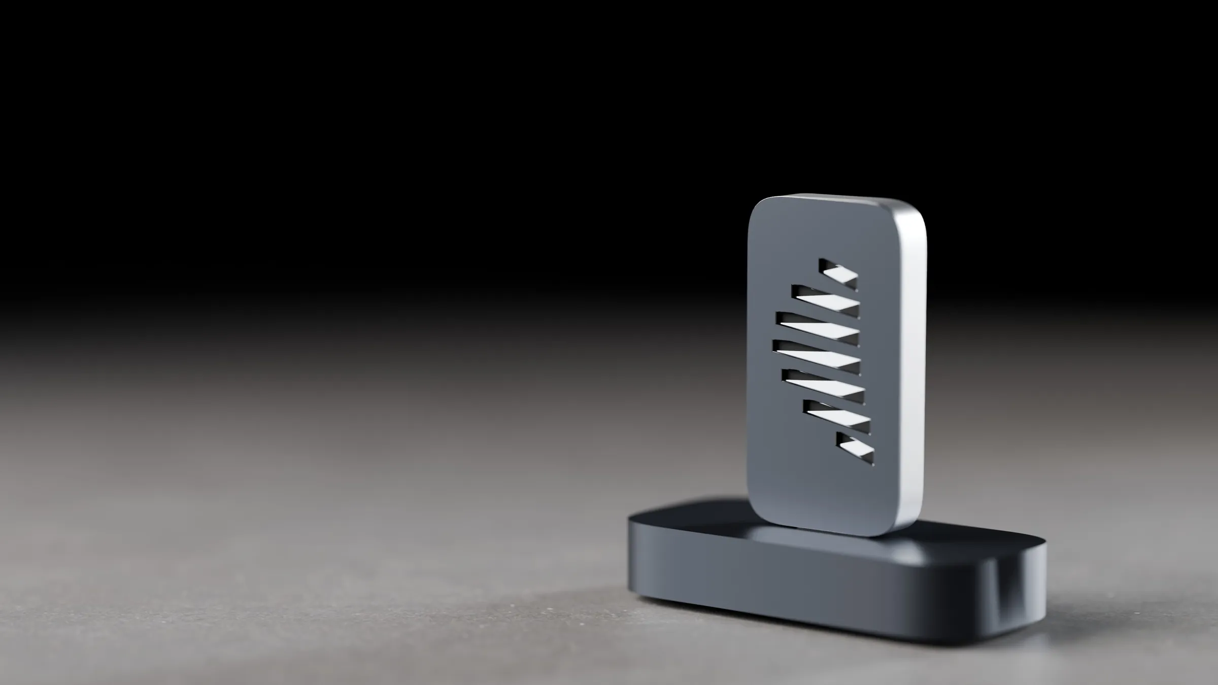 The owner’s Key standing in its reader on dark basalt